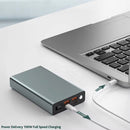 Mach 1 Lithium 100W power bank delivering full-speed charging to laptop and smartphone simultaneously via USB-C fast charge